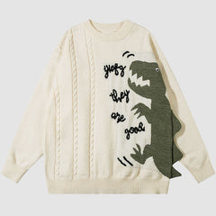 Suéter de color liso con patchwork y estampado de dinosaurio
