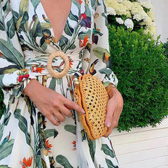 Bedrucktes Kleid mit unregelmäßigem Revers und Knopf