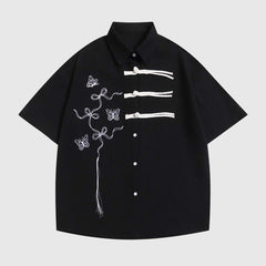 Camisa minimalista con arte bordado