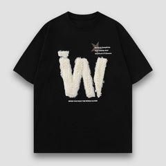 Camiseta con letras bordadas