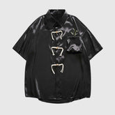 Camisa elegante con corazón bordado