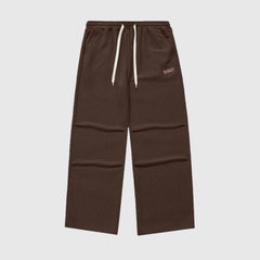 Pantalones lisos con estampado de gofres y letras bordadas