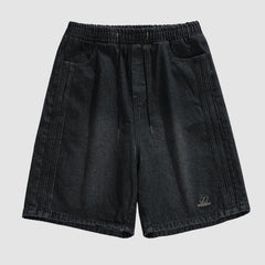 Pantalones cortos lavados con bordado lateral