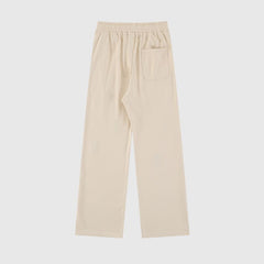 Pantalones deportivos con diseño de botones coloridos