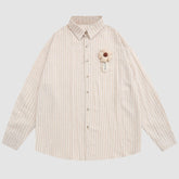 Camisas de rayas con decoración floral