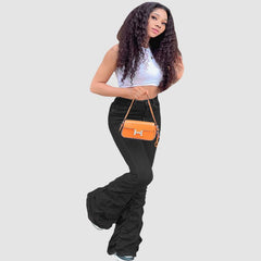 Vaqueros plisados elásticos de color liso