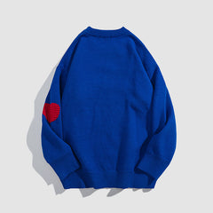 Suéter con estampado de tres corazones