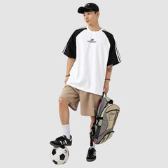 Camiseta raglán con rayas en contraste