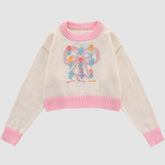 Süßer kurzer Pullover mit Schleife und Blumenmuster