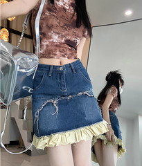 Falda vaquera degradada con paneles con volantes