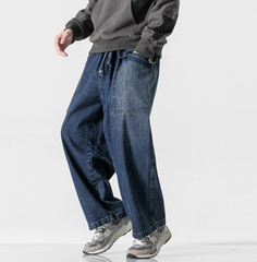 Jeans de pierna ancha con diseño plisado