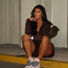 Top de malla con lazo y manga larga