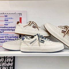 Zapatos de lona blancos de punta redonda y estilo grande para hombre