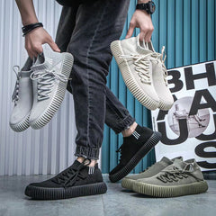 Zapatos transpirables de malla con suela Caterpillar para hombre