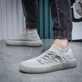 Zapatos transpirables de malla con suela Caterpillar para hombre