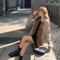 Blazer de diseño británico con cuadros y costuras