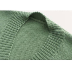 Niedlicher Strickjackenpullover mit Kuhmuster