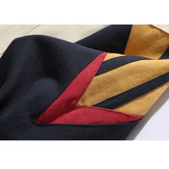 Jacke mit Farbblockärmeln und Bergstickerei