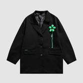 Blazer con decoración floral desmontable