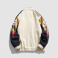 Jacke mit Farbblockärmeln und Bergstickerei