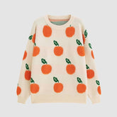 Süßer Strickpullover mit orangefarbenem Muster