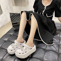 Zueco de jardín con carita sonriente