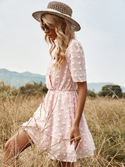 Vestido de lunares rosas de manga corta con cintura alta