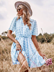 Vestido de lunares rosas de manga corta con cintura alta