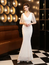 Vestido de noche elegante con borlas y cuentas