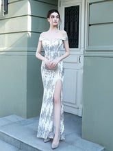 Vestido de banquete con cola de pez y cuentas