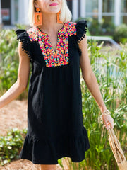 Falda de cintura alta con flecos en el pecho