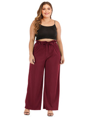 Pantalones casuales de pierna ancha con lazo holgado de color liso y micro acampanados de talla grande