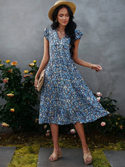 Vestido floral con escote en V y mangas abullonadas