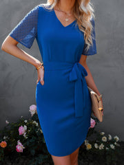 Vestido holgado con volantes y cuello alto