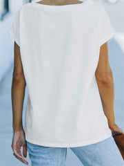 Top con hombros descubiertos y bolsillo con bandera estadounidense