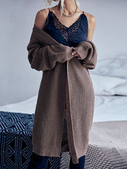 Einfarbige lange Strickjacke