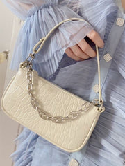 Bolso de mano con estampado de cocodrilo que combina con todo