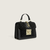 Bolso de mano con textura y tapa abatible