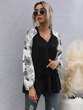 Camiseta holgada con cuello en V