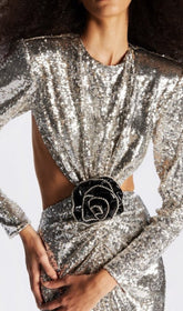 Vestido largo con aberturas y lentejuelas en tono metalizado