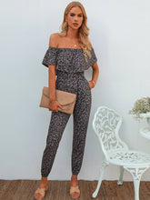 Mono con espalda abierta y estampado de leopardo