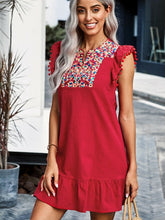 Falda de cintura alta con flecos en el pecho