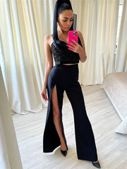 Pantalón casual de pierna ancha con abertura estrecha