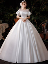 Vestido de novia francés estilo Hepburn, sencillo y súper elegante.