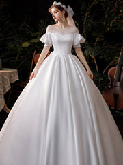Vestido de novia francés estilo Hepburn, sencillo y súper elegante.