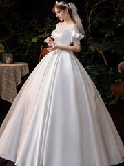 Vestido de novia francés estilo Hepburn, sencillo y súper elegante.