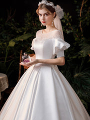 Vestido de novia francés estilo Hepburn, sencillo y súper elegante.