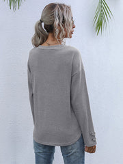 Camiseta de color liso con cuello en V