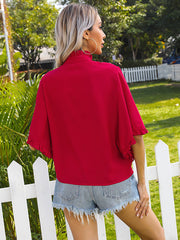 Camisa de manga corta con volantes