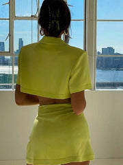 Women's solid color short-sleeved buckle-buttoned buttocks suit skirt suit